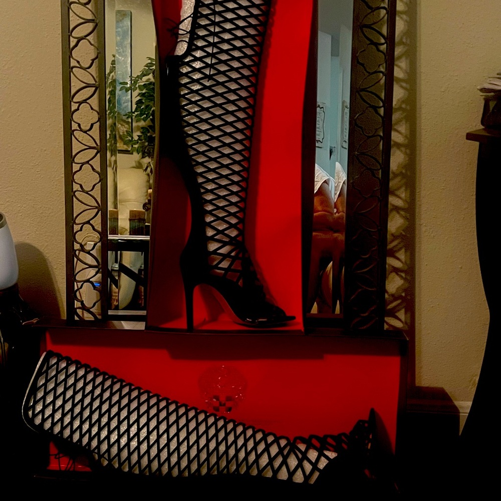 Black, Vince Camuto, high heeled boot. Never worn…in original box.